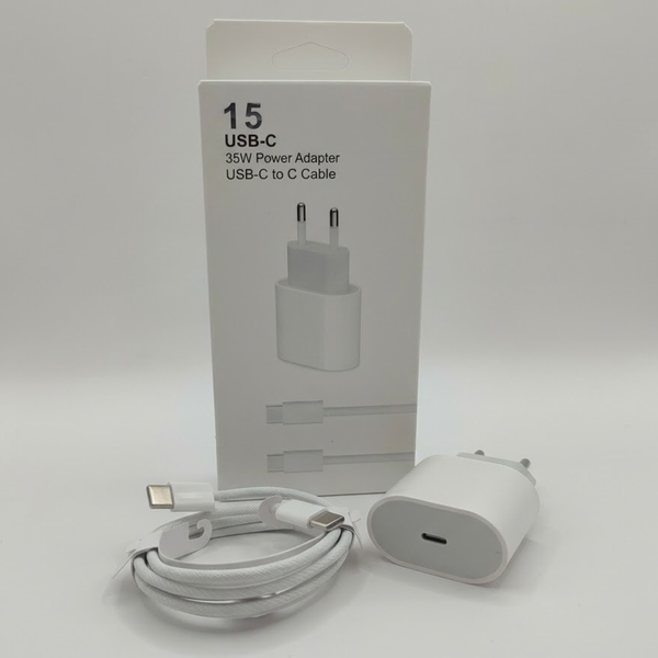 Адаптер живлення 35W з портом USB-C. У кадрі також згорнутий білий плетений кабель Type-C to Type-C, швидка зарядка для гаджетів.