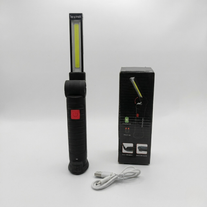 Акумуляторний робочий ліхтар Worklight W-52 у розкладеному вигляді поруч із заводською коробкою та білим кабелем Micro-USB.