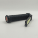 Компактний складаний ліхтар Worklight W-52 у горизонтальному положенні, що демонструє текстуровану антиковзну ручку та торцевий LED-діод.